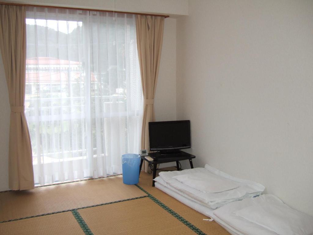Pension Takatsuki Zamami Ruang foto