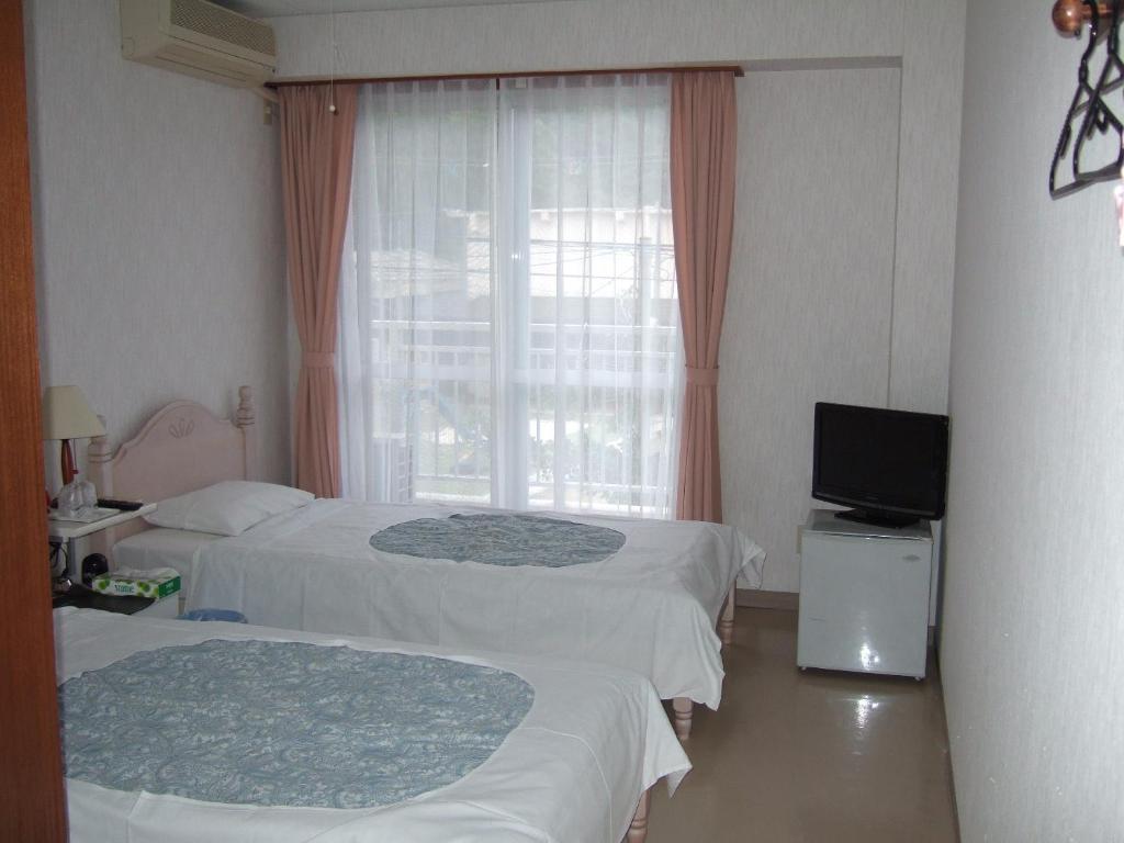 Pension Takatsuki Zamami Ruang foto